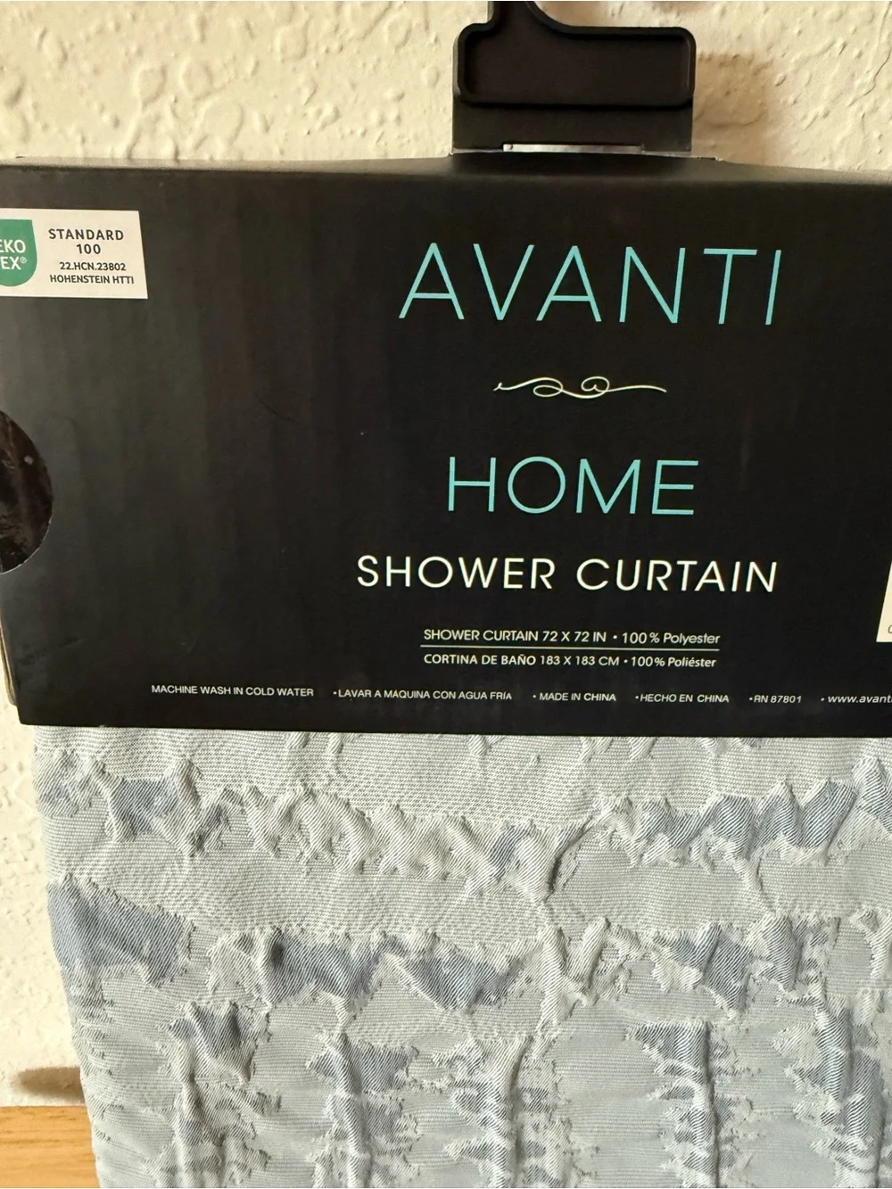 Avanti Modern Shells Shower Curtain in Light Blue.